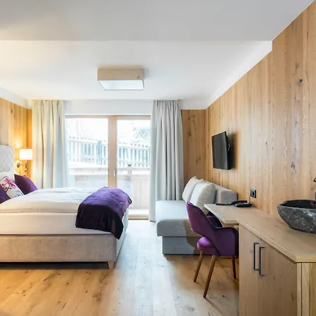 Boutiquehotel Alpbacherin 4 Sterne Superior מלון 4*